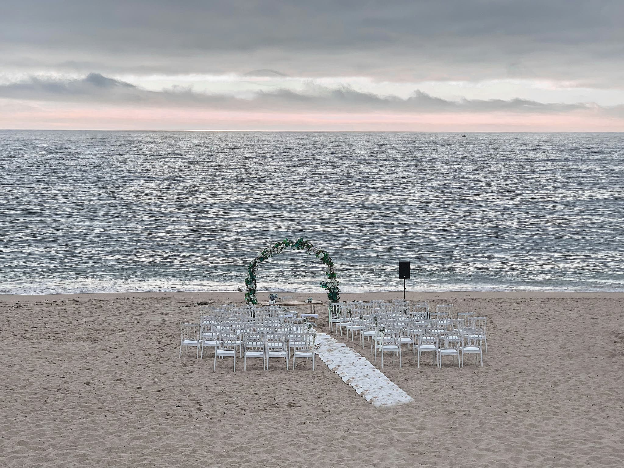 Romantic beachfront wedding ceremony setup in Thailand