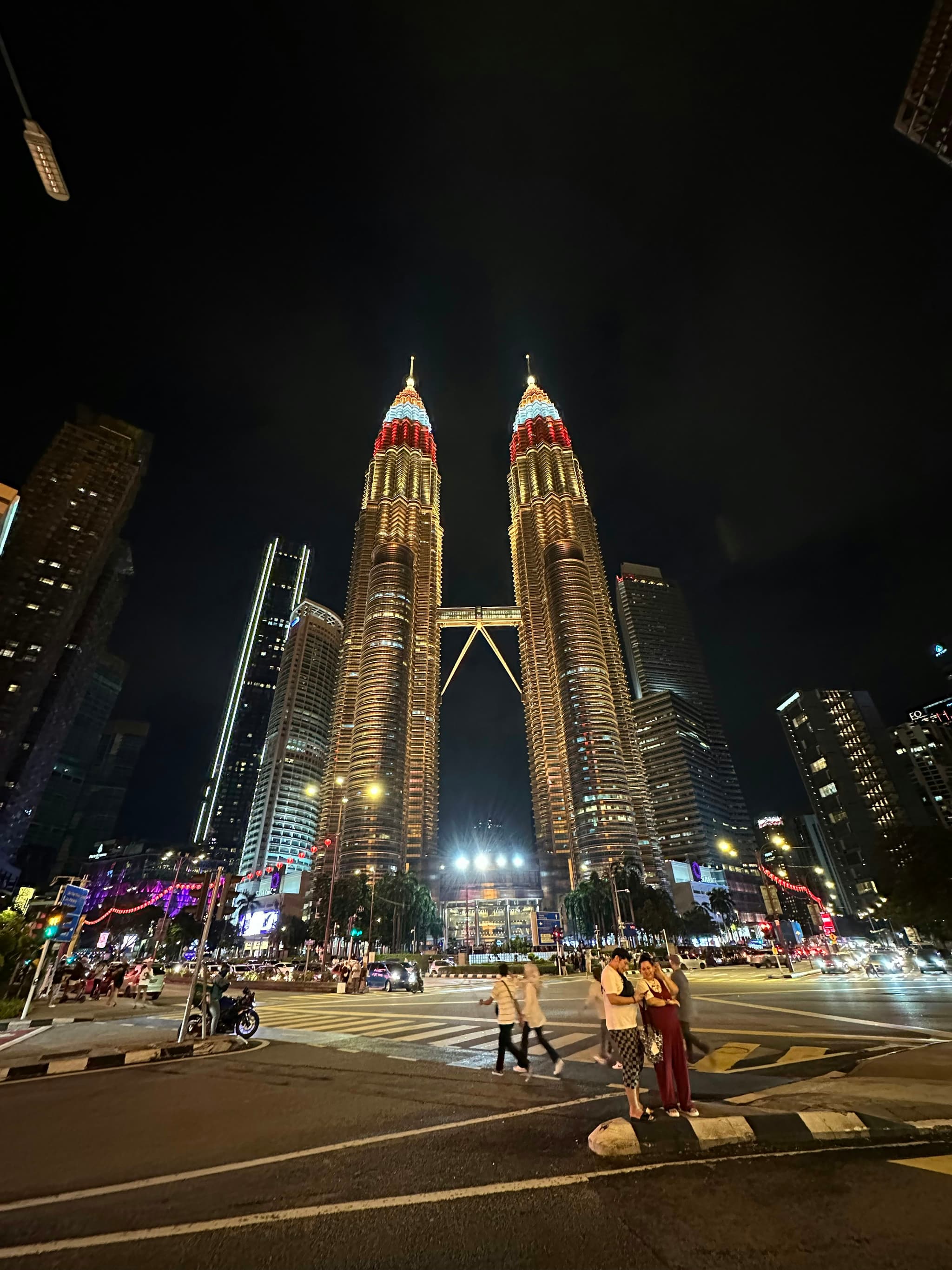 Kuala Lumpur skyline with Petronas Twin Towers illuminated at night