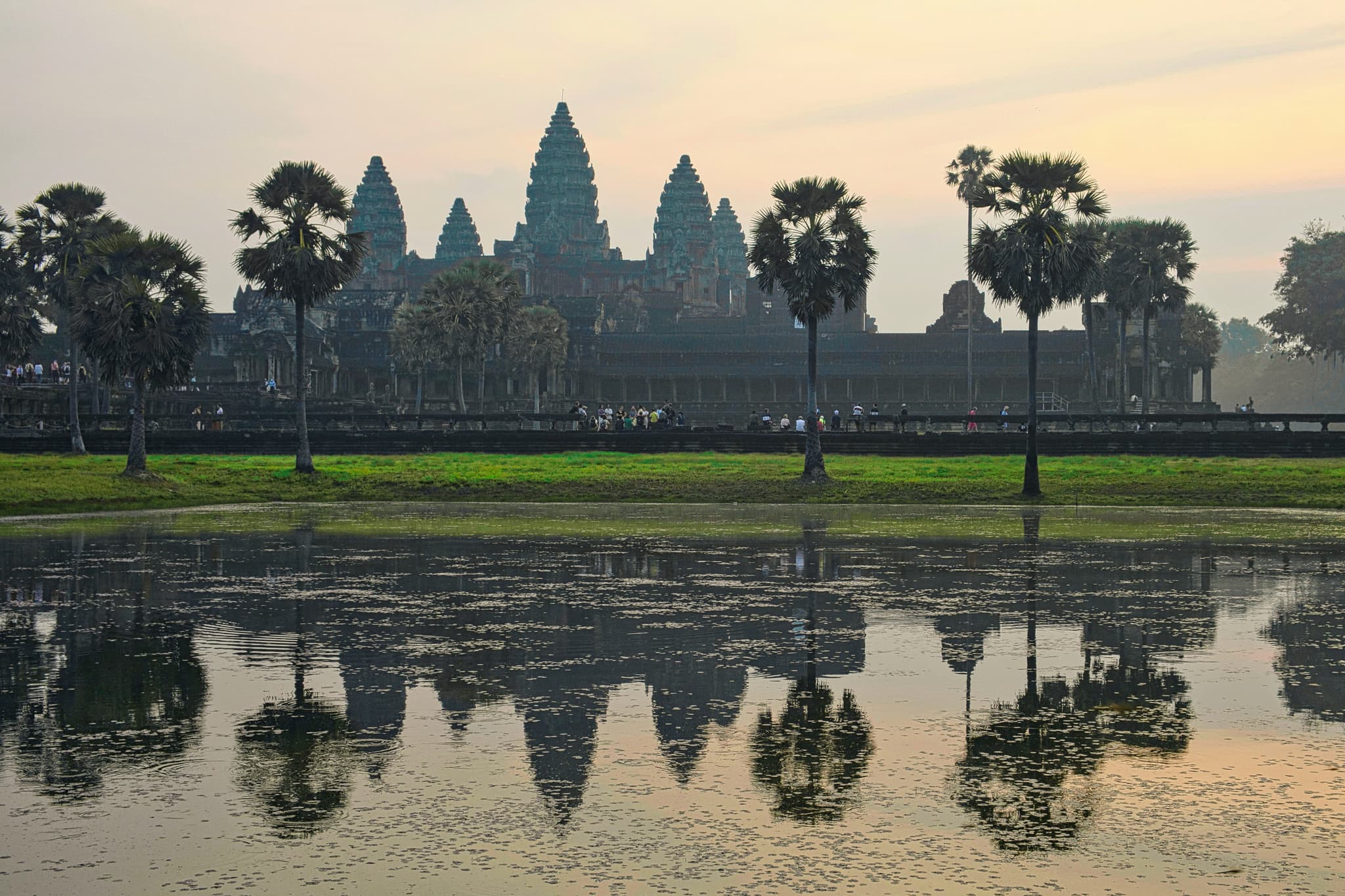 Angkor Wat temple complex in Cambodia reflected in the moat at sunrise