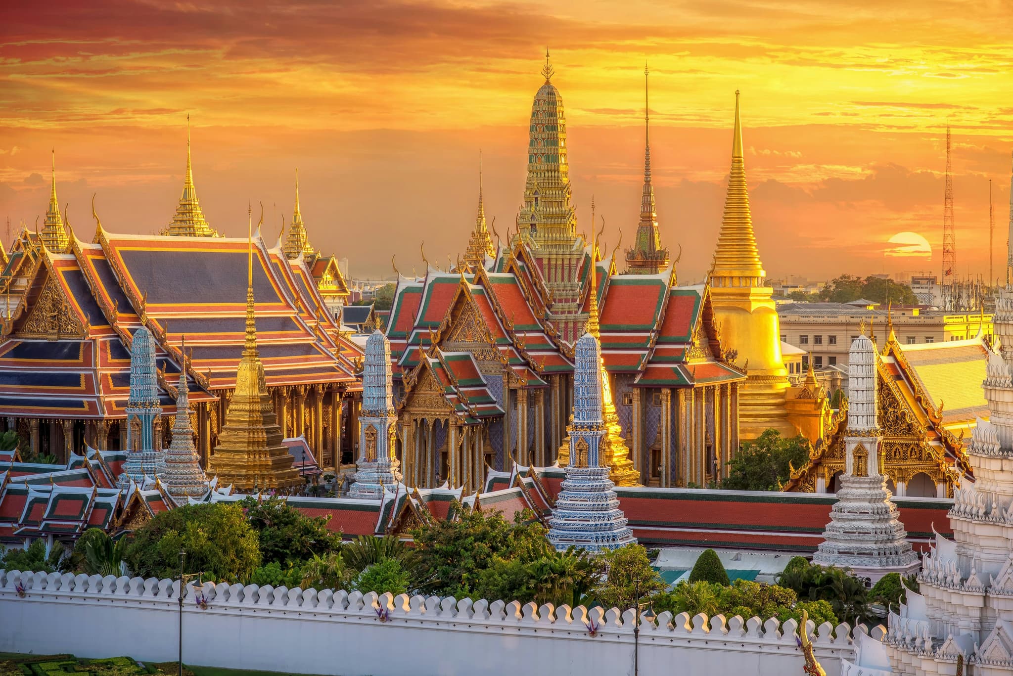 Grand Palace Bangkok golden spires and ornate Thai architecture at dusk Thailand