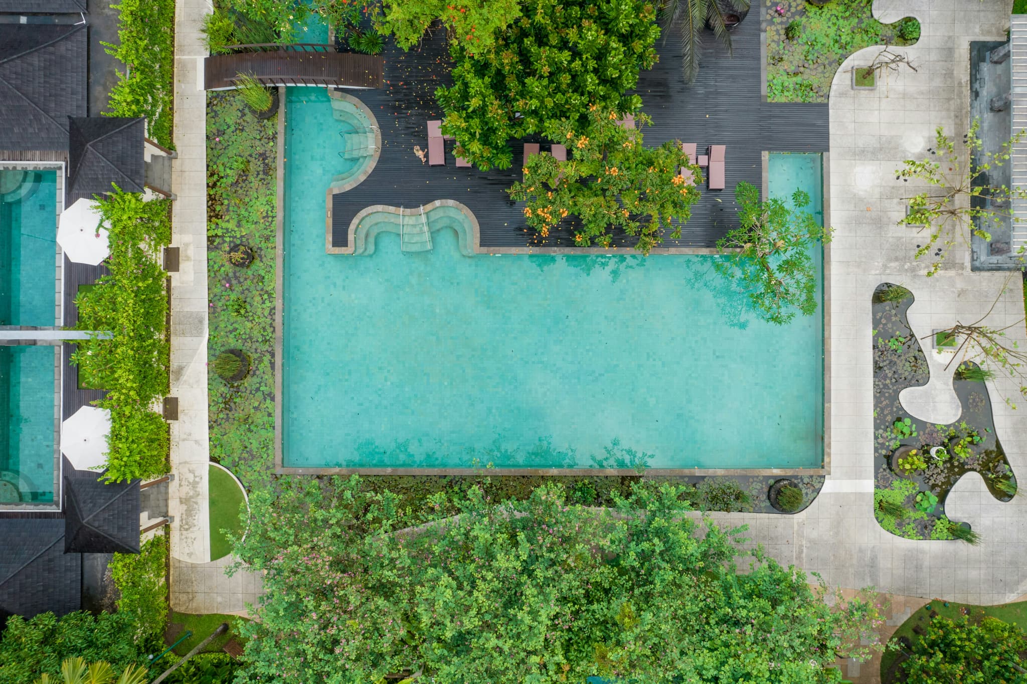Luxury resort pool overlooking tropical Thailand landscape